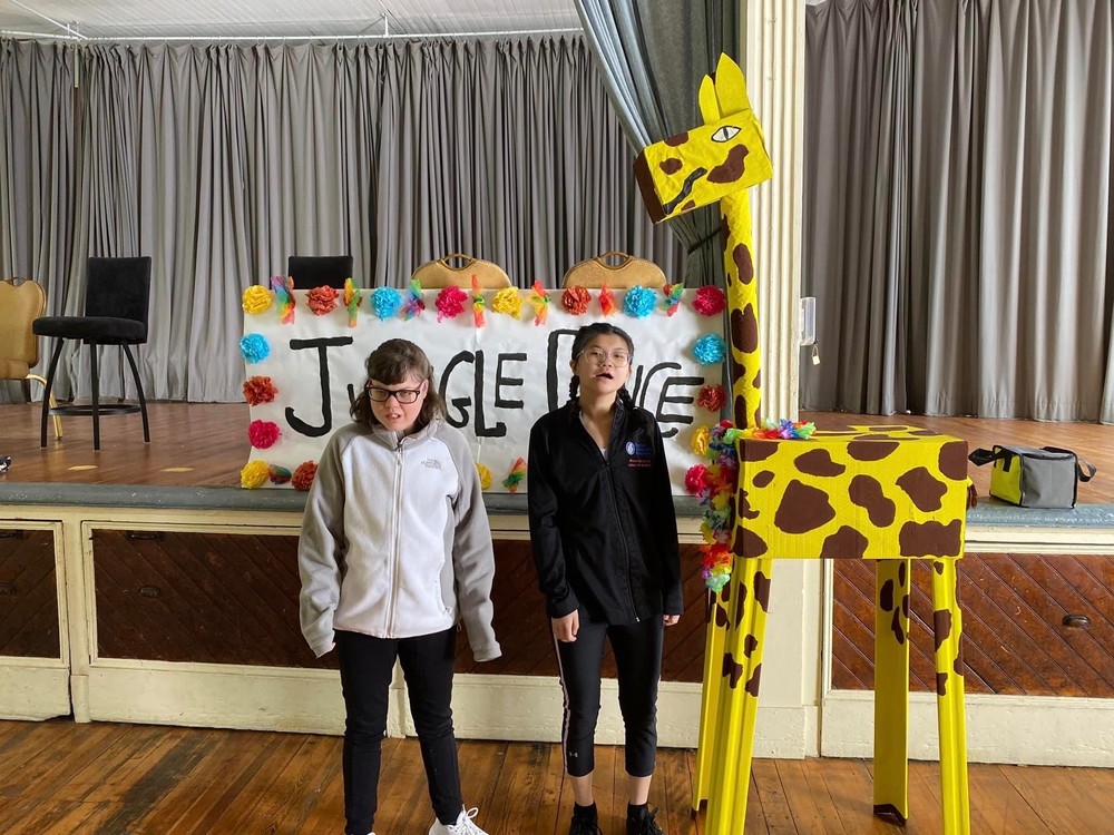 Two students with Giraffe