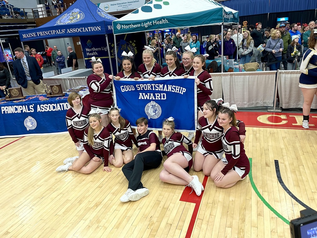 Team receiving sportsmanship banner